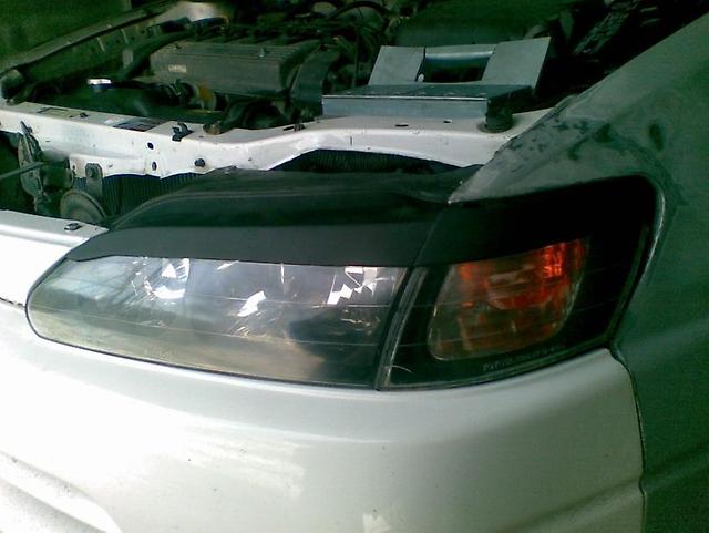 картинка Реснички, крепления для фар на Toyota Levin, Trueno AE111 магазин  StreetTuning 