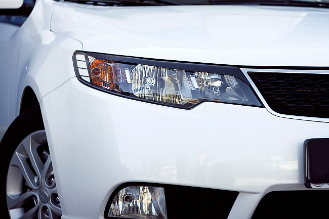 картинка Kia Cerato Forte 2008—2013 Накладки на передние фары (реснички) компл.-2 шт. магазин  StreetTuning 