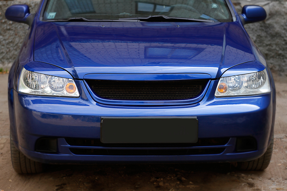 картинка Сhevrolet Lacetti(седан) 2004—2013 Накладки на передние фары (реснички) компл.-2 шт. от магазина  StreetTuning