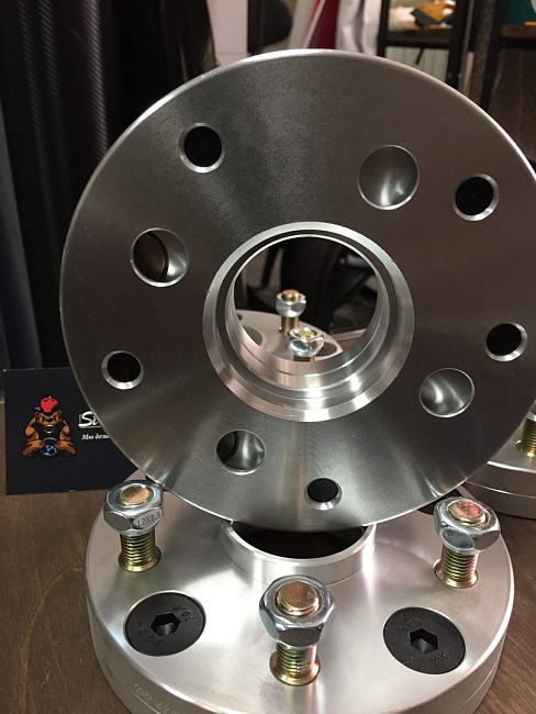 картинка Проставка переходная 25 мм 4x98-5x114.3-ц. о 58.6-57.1 шпилька 12x1.5 магазин  StreetTuning 