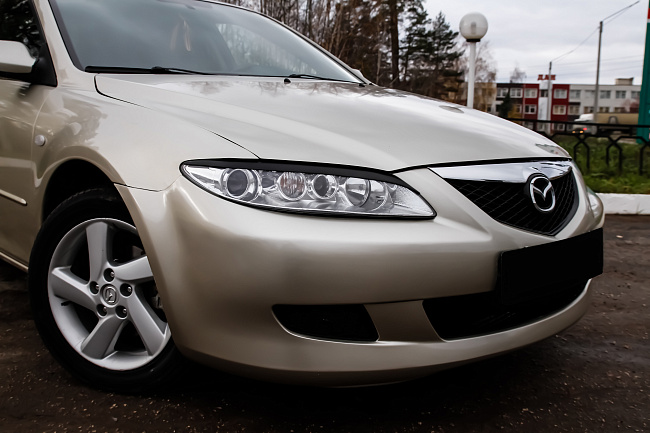 картинка Mazda 6 2002—2007 Накладки на передние фары (реснички) компл.-2 шт. магазин  StreetTuning 