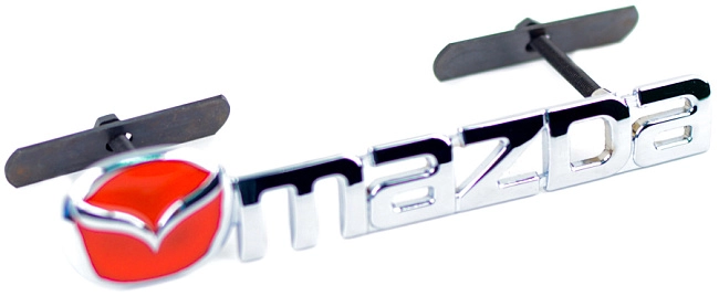 картинка Шильдик в решетку радиатора с логотипом "Mazda" магазин  StreetTuning 