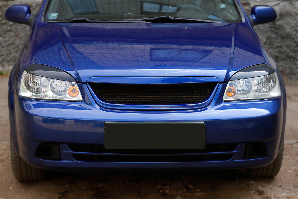 картинка Сhevrolet Lacetti(седан) 2004—2013 Накладки на передние фары (реснички) компл.-2 шт. от магазина  StreetTuning
