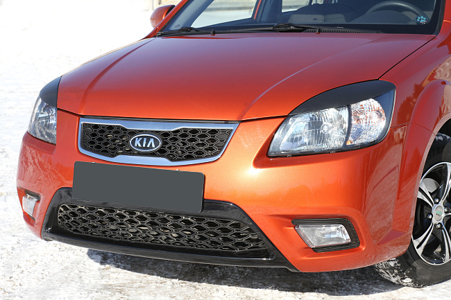 картинка Kia Rio (DE) 2005—2011 Накладки на передние фары (реснички) компл.-2 шт. магазин  StreetTuning 