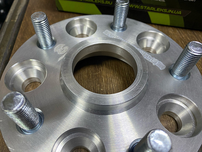 картинка Проставка переходная 20 мм 5x112-5x114.3,ЦО 66.6-60.1 шпилька 12x1.5 магазин  StreetTuning 